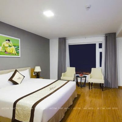 View khách sạn Dendro Gold Nha Trang vào ban đêm